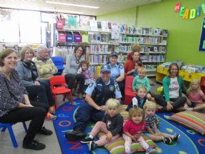 Some parents and grandparents were on hand when Officer Karen Nelligan and Sarah Bancroft read to pre-schoolers in the Bega Library on Thursday. The children are Billie Finnegan, Cormac Ryan, Judd Mackey, Arlo, Riley, Isla Sweeny and Juniper.
