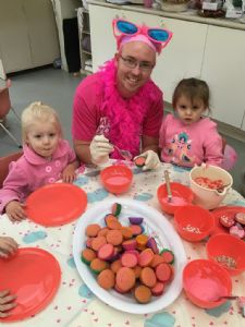 Bandara Children’s Services educator Daryl Kelland in the pink with (L-R) Olivia Doust and Tahli Eves.