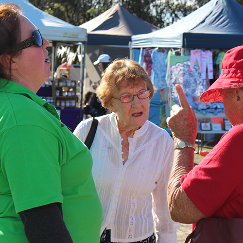 Council’s Loretto Mills speaking with community members at the Merimbula Rotary Markets.