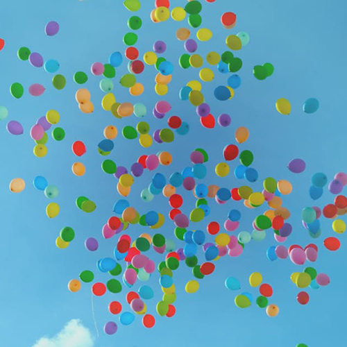 Image of released balloons.