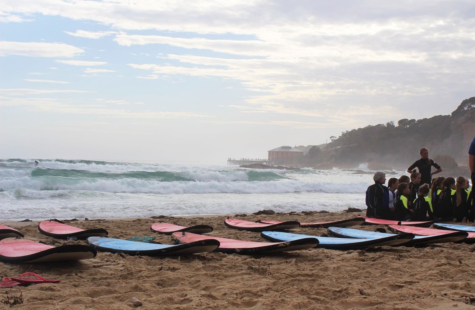Student surfers at Tathra beach